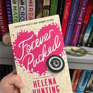 Forever Pucked by Helena Hunting paperback with sprayed edges